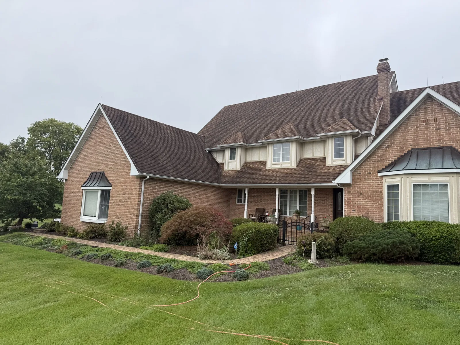 Aging shingle roof assessed for rejuvenation in Martinsburg WV by Thompson's Pressure Washing