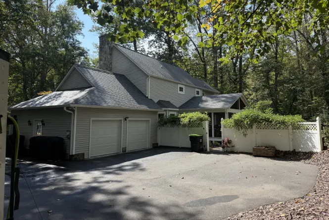 Full exterior and driveway wash by Thompson's Pressure Washing